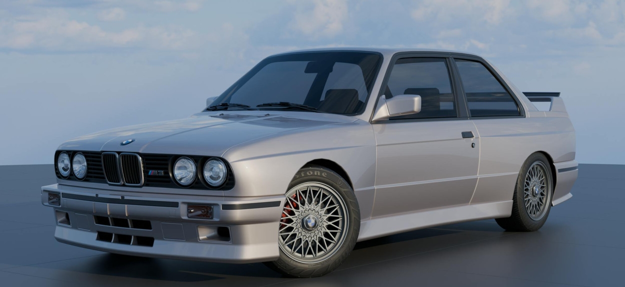 Sivi BMW M3 E30 portret automobila na studijskoj podlozi, prikazan u punom profilu sa proširenim blatobranima